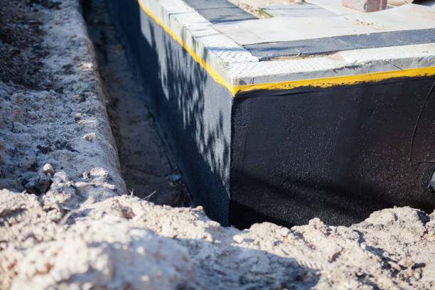 Professional Waterproofing technician working in Elma, NY